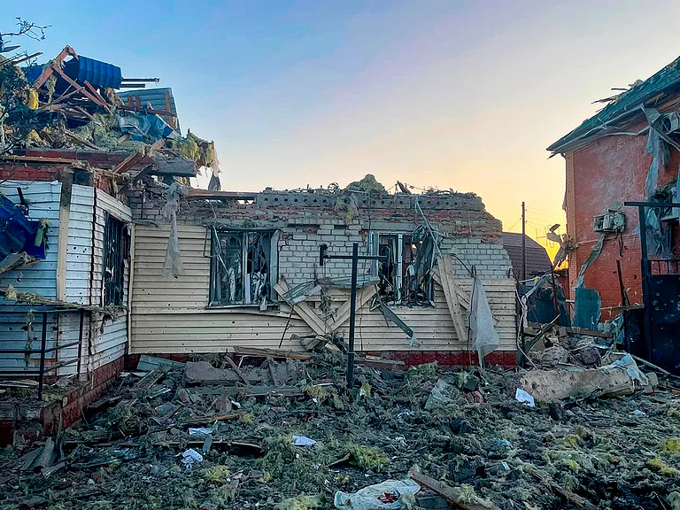 This photo released by the acting Governor of Kursk region Alexei Smirnov telegram channel on Tuesday, Aug. 6, 2024, shows a damaged house after shelled by the Ukrainian side in the city of Sudzha, Kursk region that borders Ukraine - AP